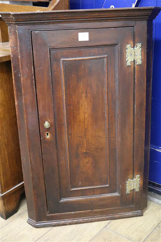 A late 18th century hanging corner cupboard W.66cm